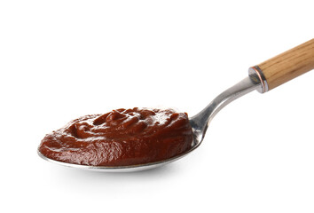 Spoon of delicious chocolate pudding isolated on white background
