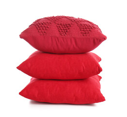 Stack of red pillows on white background