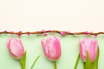 Blank greeting card, vine and beautiful tulip flowers on green background
