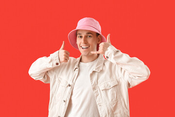 Cool young man showing 