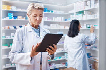 Tablet, senior woman and pharmacist in pharmacy order medication online in drugstore. Healthcare,...