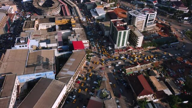 Drone shot over a traffic jam in sunny Yaounde city, Cameroon, Central Africa