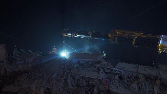 Earthquake, search and rescue.
Carrying out search and rescue operations on the wreckage with the help of a crane on the collapsed building in the earthquake. 