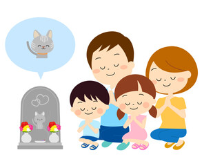 ペットのお墓参りをする家族（春夏）