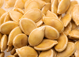 pumpkin seeds on a white background