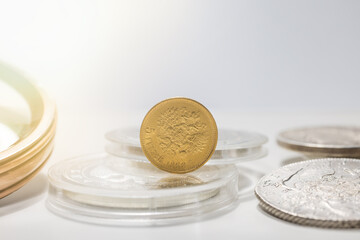 Numismatics. Old collectible coins on the table.