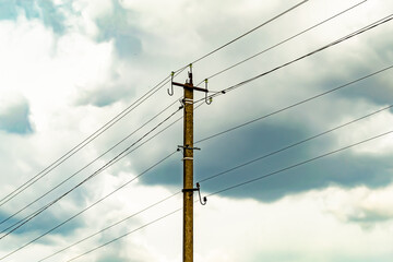 Power electric pole with line wire on colored background close up