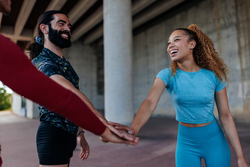 Athletes creating hand stack