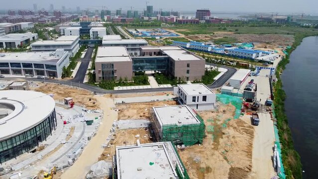 Weihai Olympic center construction complete panning left. - Nanhai New District, China.