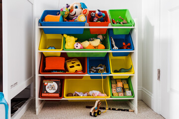Child's toys on shelf in baby bedroom