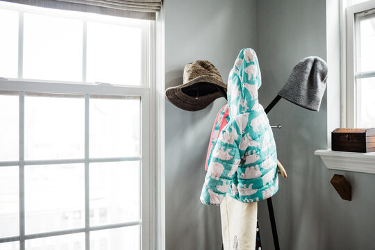 Coat rack with little girl's coat