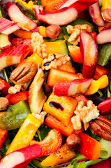 Spring salad with rhubarb, greens and nuts.