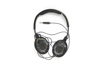worn-out headphones isolated on white background