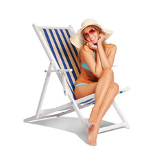 Happy woman sunbathing on a deckchair