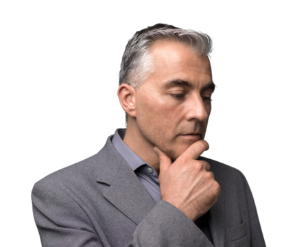 Pensive businessman with hand on chin