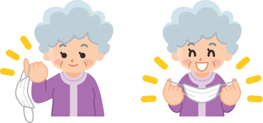 笑顔でマスクを外す高齢女性