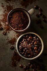 Coffee beans and ground coffee  in ceramic cups. Top view. Copy space - 572189232