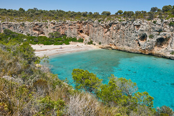 Turquoise waters in Mallorca. Pilota cove. Mediterranean coastline. Balearic islands