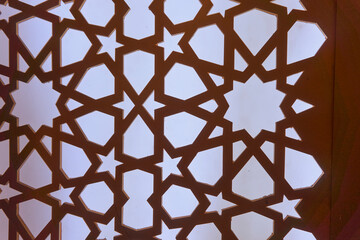 Silhouette of laser cut template panel with blue light. Arabian ornamental panel set. Silhouette or...