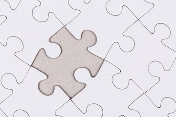 white puzzle jigsaw close up