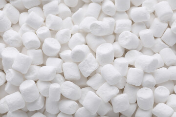 Fototapeta na wymiar Many delicious sweet marshmallows as background, closeup