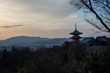 sunset over the budist temple in japan