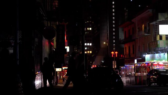 Moody night scene tilt down in Chinatown.  San Francisco, CA. Slow motion 60fps.