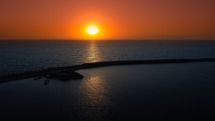 Obraz premium Sunrise over Black Sea. Aerial view of a beautiful summer sea sun rise. Nature sea landscape wallpaper image.