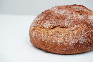 Loaf of bread still life. food, baking and cooking concept - close up of bread