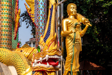 Fototapeta premium Golden statue at a Buddhist temple in Mae Sot Thailand