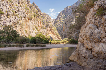 Torrent de Pareis beach, sa Calobra in Mallorca, Spain, most beautiful beach. deepest canyon amd anazing mountains of Mallorca island, Spain