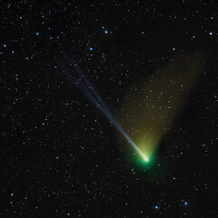 Obraz na płótnie Canvas Comet C2022 E3, bright green nucleus and Comet's ion tail. 