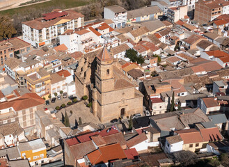 Fototapeta na wymiar Aerial photo from drone to city of Loja and Church of the Incarnation with Moorish Alcazaba and Gorda Peak at Loja ,Granada, Andalusia, Spain, Europe (Series)