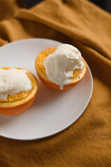 baked oranges with vanilla ice cream