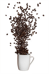 Roasted coffee beans spread out on a transparent PNG background. The beans have been spread out from a white cup. Copy space around