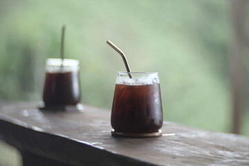 Ice Black Coffee or Americano Coffee in nature background.