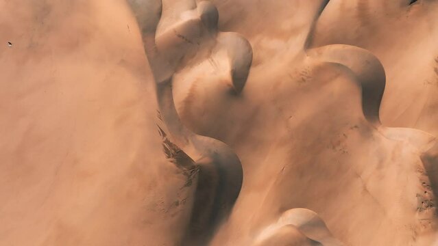 Panoramic aerial scene of the Maspalomas Dunes in Playa del Ingles, Maspalomas, Gran Canaria, Spain. Endless desert sands. Magical safari dunes.