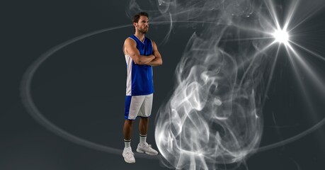 Fototapeta na wymiar Composition of male basketball player with arms crossed with copy space