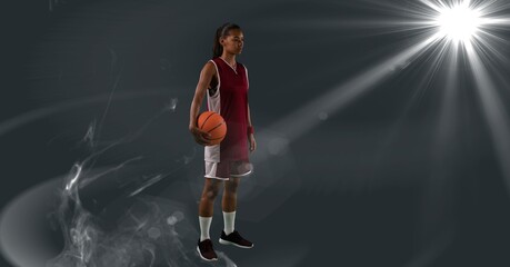 Composition of female basketball player holding basketball with copy space