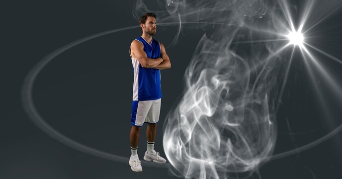 Composition of male basketball player with arms crossed with copy space