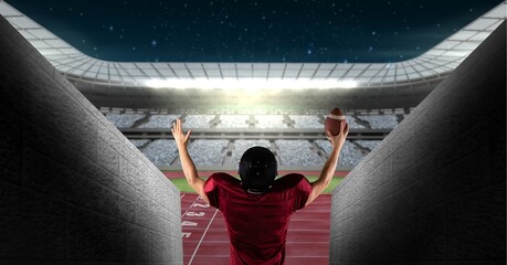 Composition of male american football player holding ball and raising hands over sports stadium