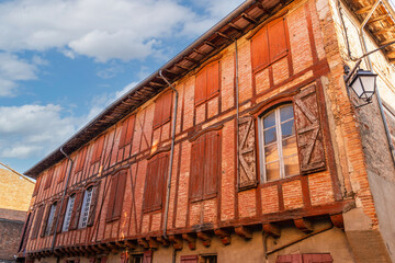 Facades of townhouses, in Lisle sur Tarn, in the Tarn, in Occitanie, France