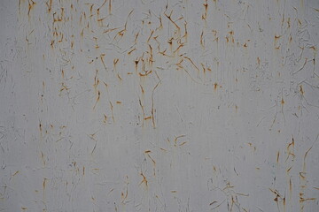 Old scratched and rusty painted metal surface, background texture. Texture of metal rusty wall