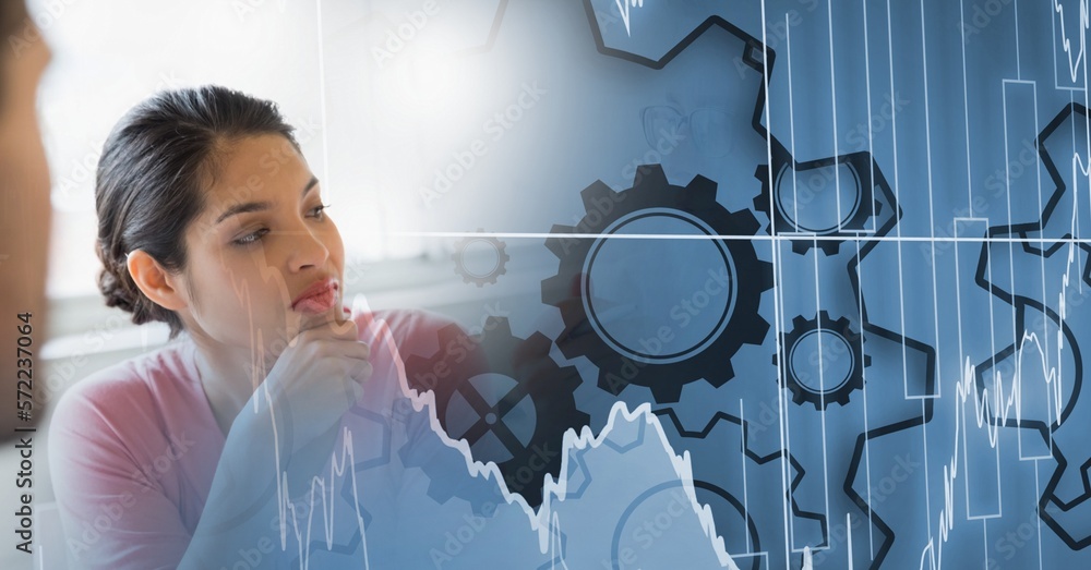Poster composition of diverse business team in meeting over interface with graph