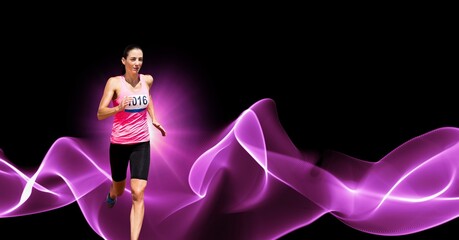 Composition of female athlete running with copy space and pink light trails