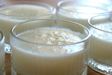 Rice pudding turkish dessert in glass bowl.