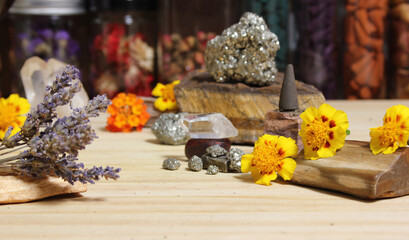 Dried Lavender on Palo Santo Sticks With Crystals and Flowers in Background