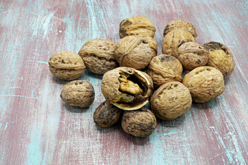 organic walnuts on wooden background