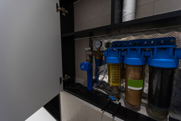 Subang Jaya, Selangor, Malaysia - December 27, 2019 : Outdoor master whole house water purification filter system. Stainless steel and fiberglass water filter system.