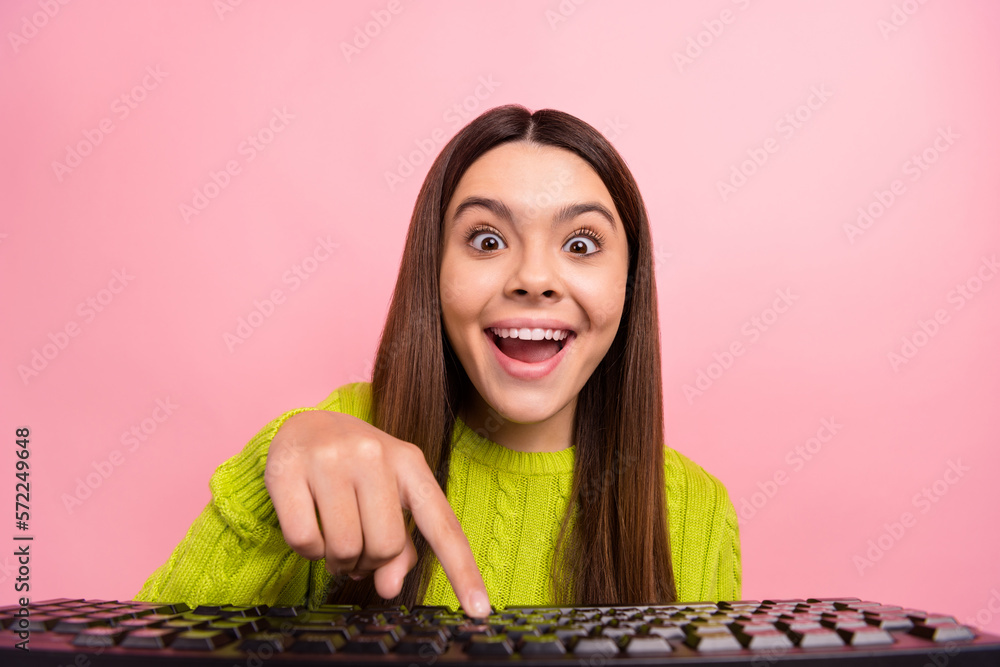 Poster photo portrait of cute young girl press key keyboard type funky face fooling wear trendy green garme